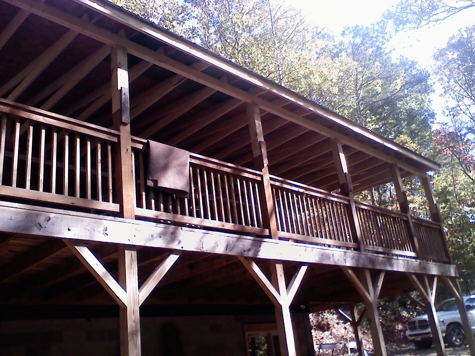 Timber framing under a new elevated porch and deck — Roof Leak Repair in Lincoln by Roofing Brothers